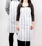 Apron with wheat stripes screen print, designed by Curious Lions and made in the UK. This unisex natural cotton item makes a rustic gift.