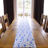 Table runner in linen with screen printed ivy design, washable with hemmed edge 215 x 32cm. Created and made by Curious Lions in the UK.